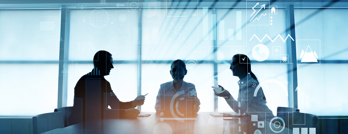 Double exposure of virtual screen and colleagues at business meeting in office #image_title